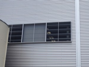 Maxiflow Louvres clad with corrugated sheet metal. Includes custom built insect mesh screens. 